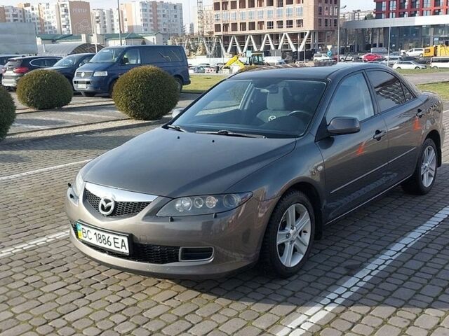 Серый Мазда 6, объемом двигателя 2 л и пробегом 260 тыс. км за 5200 $, фото 1 на Automoto.ua