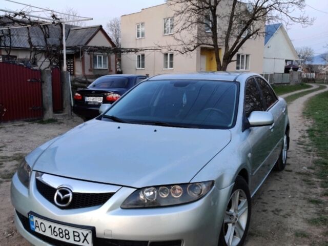 Серый Мазда 6, объемом двигателя 1.8 л и пробегом 200 тыс. км за 5000 $, фото 1 на Automoto.ua