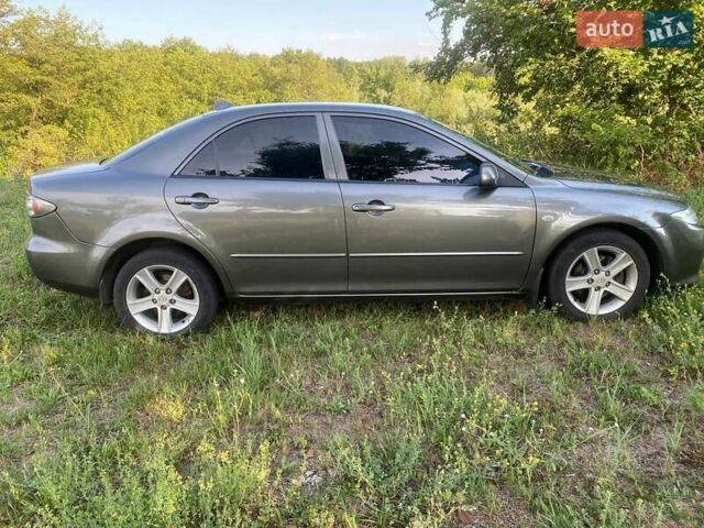 Серый Мазда 6, объемом двигателя 2 л и пробегом 333 тыс. км за 4800 $, фото 1 на Automoto.ua