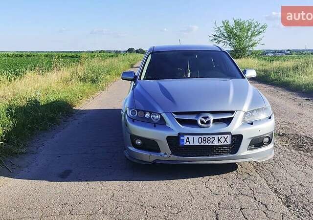 Серый Мазда 6, объемом двигателя 2.26 л и пробегом 245 тыс. км за 6050 $, фото 1 на Automoto.ua