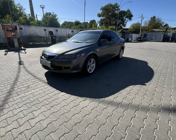 Серый Мазда 6, объемом двигателя 2 л и пробегом 243 тыс. км за 2900 $, фото 1 на Automoto.ua