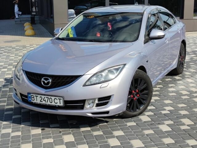 Серый Мазда 6, объемом двигателя 2 л и пробегом 295 тыс. км за 6700 $, фото 1 на Automoto.ua