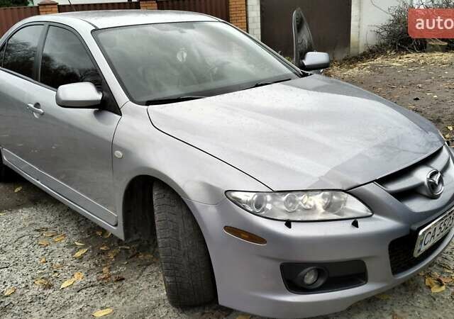 Сірий Мазда 6, об'ємом двигуна 2.3 л та пробігом 206 тис. км за 6995 $, фото 1 на Automoto.ua