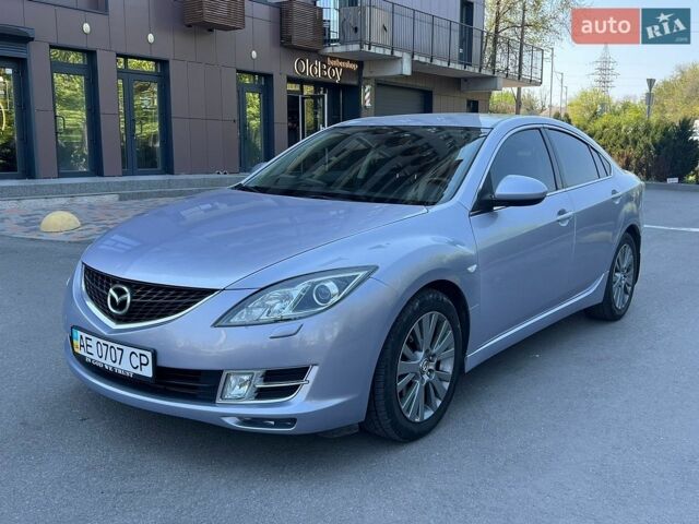 Серый Мазда 6, объемом двигателя 2 л и пробегом 312 тыс. км за 6900 $, фото 1 на Automoto.ua