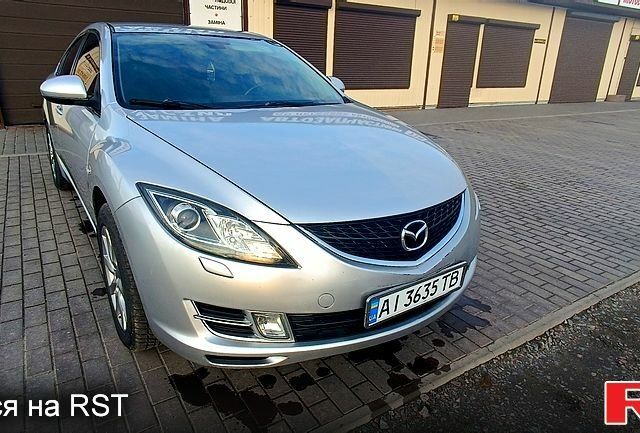 Серый Мазда 6, объемом двигателя 2 л и пробегом 240 тыс. км за 6700 $, фото 1 на Automoto.ua