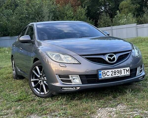 Серый Мазда 6, объемом двигателя 2 л и пробегом 301 тыс. км за 6699 $, фото 1 на Automoto.ua