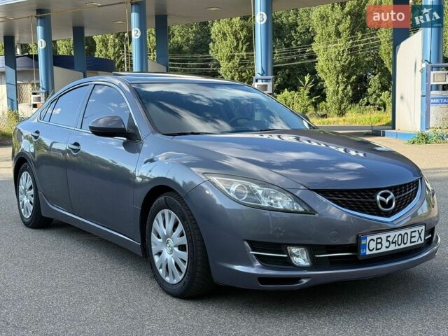 Серый Мазда 6, объемом двигателя 2 л и пробегом 349 тыс. км за 6700 $, фото 1 на Automoto.ua