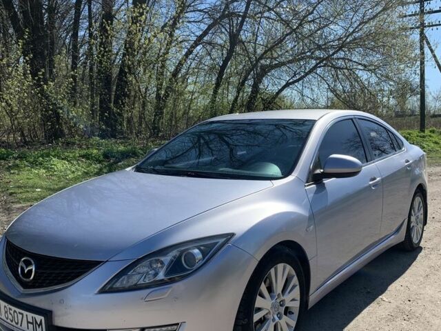 Серый Мазда 6, объемом двигателя 2 л и пробегом 241 тыс. км за 6200 $, фото 1 на Automoto.ua