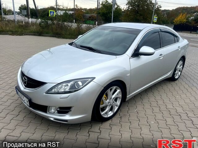 Серый Мазда 6, объемом двигателя 1.8 л и пробегом 240 тыс. км за 5999 $, фото 1 на Automoto.ua