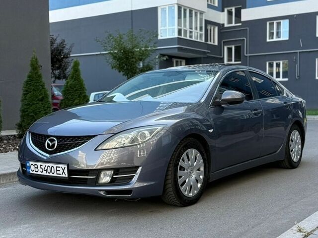 Серый Мазда 6, объемом двигателя 2 л и пробегом 350 тыс. км за 6600 $, фото 1 на Automoto.ua