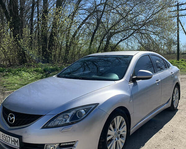 Серый Мазда 6, объемом двигателя 2 л и пробегом 230 тыс. км за 6800 $, фото 1 на Automoto.ua