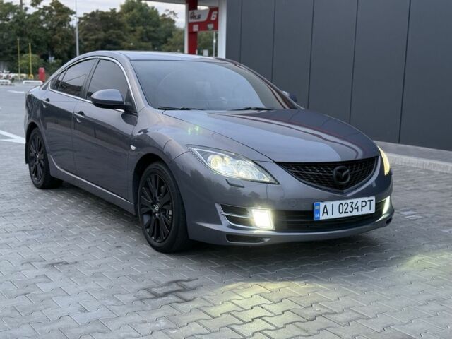 Серый Мазда 6, объемом двигателя 2 л и пробегом 245 тыс. км за 7400 $, фото 1 на Automoto.ua