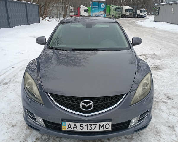 Серый Мазда 6, объемом двигателя 2 л и пробегом 331 тыс. км за 7000 $, фото 1 на Automoto.ua