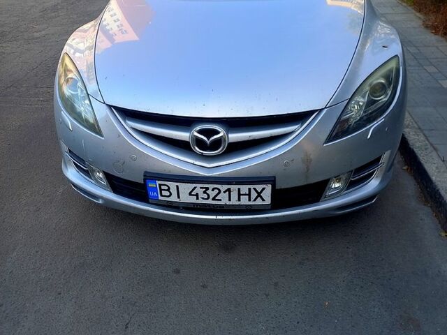 Серый Мазда 6, объемом двигателя 2 л и пробегом 264 тыс. км за 7000 $, фото 1 на Automoto.ua