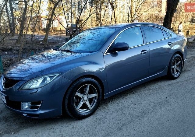 Серый Мазда 6, объемом двигателя 2 л и пробегом 331 тыс. км за 6450 $, фото 1 на Automoto.ua