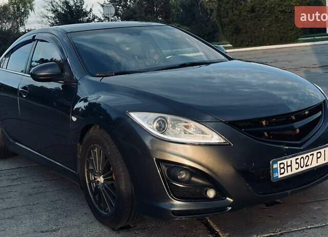 Серый Мазда 6, объемом двигателя 2.49 л и пробегом 298 тыс. км за 7999 $, фото 1 на Automoto.ua