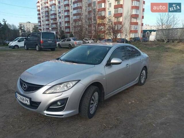 Серый Мазда 6, объемом двигателя 1.8 л и пробегом 249 тыс. км за 7800 $, фото 1 на Automoto.ua