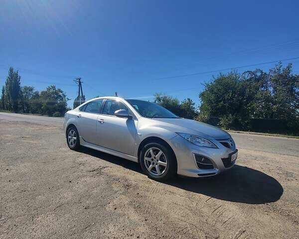 Серый Мазда 6, объемом двигателя 2 л и пробегом 106 тыс. км за 9500 $, фото 1 на Automoto.ua