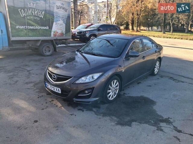 Серый Мазда 6, объемом двигателя 1.8 л и пробегом 215 тыс. км за 4999 $, фото 1 на Automoto.ua