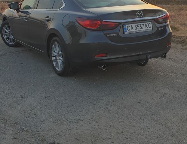 Сірий Мазда 6, об'ємом двигуна 2.18 л та пробігом 240 тис. км за 10750 $, фото 1 на Automoto.ua