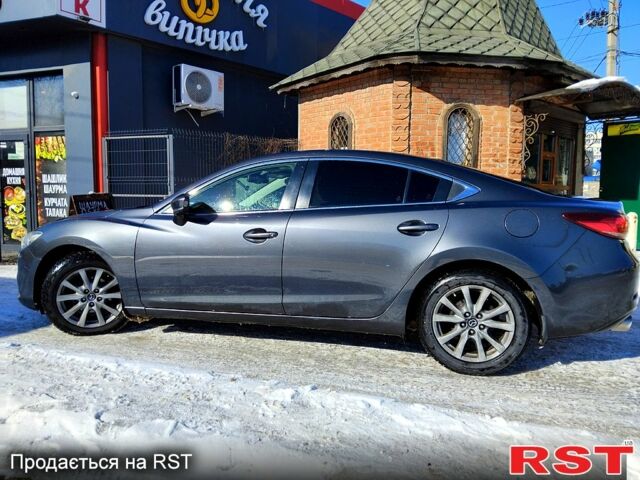 Серый Мазда 6, объемом двигателя 2 л и пробегом 153 тыс. км за 11700 $, фото 1 на Automoto.ua