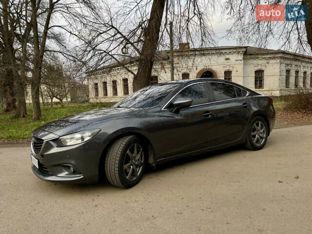 Серый Мазда 6, объемом двигателя 2.19 л и пробегом 302 тыс. км за 10000 $, фото 1 на Automoto.ua