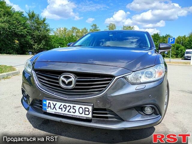 Серый Мазда 6, объемом двигателя 2 л и пробегом 148 тыс. км за 12000 $, фото 1 на Automoto.ua
