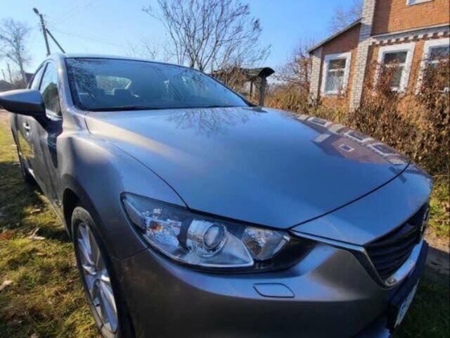 Серый Мазда 6, объемом двигателя 2 л и пробегом 31 тыс. км за 14000 $, фото 1 на Automoto.ua