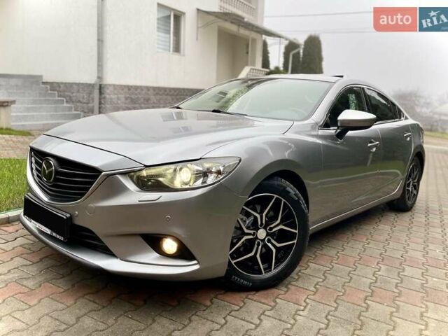 Серый Мазда 6, объемом двигателя 2.18 л и пробегом 209 тыс. км за 10850 $, фото 1 на Automoto.ua