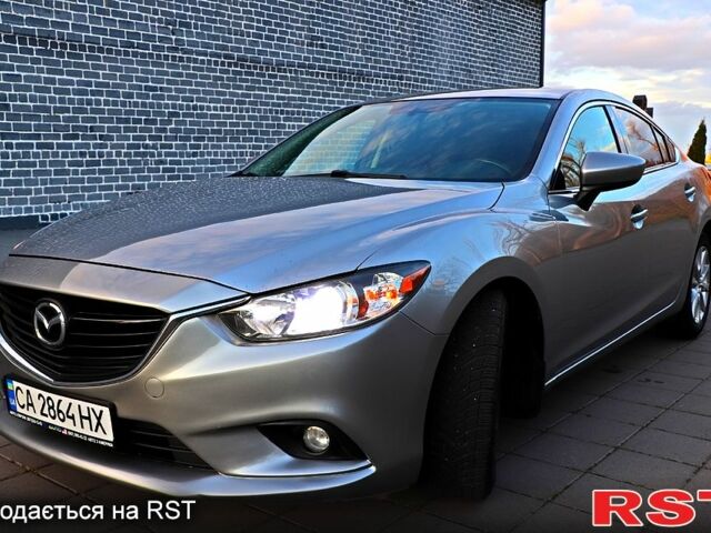 Серый Мазда 6, объемом двигателя 2.5 л и пробегом 250 тыс. км за 11555 $, фото 1 на Automoto.ua