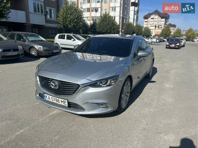 Серый Мазда 6, объемом двигателя 2 л и пробегом 182 тыс. км за 11000 $, фото 1 на Automoto.ua
