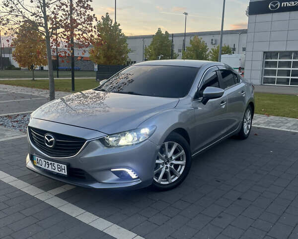 Серый Мазда 6, объемом двигателя 2 л и пробегом 250 тыс. км за 10500 $, фото 1 на Automoto.ua