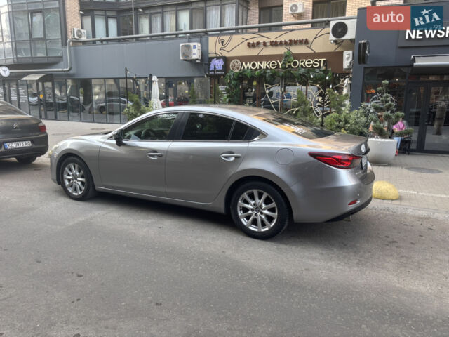 Серый Мазда 6, объемом двигателя 2 л и пробегом 250 тыс. км за 10500 $, фото 1 на Automoto.ua