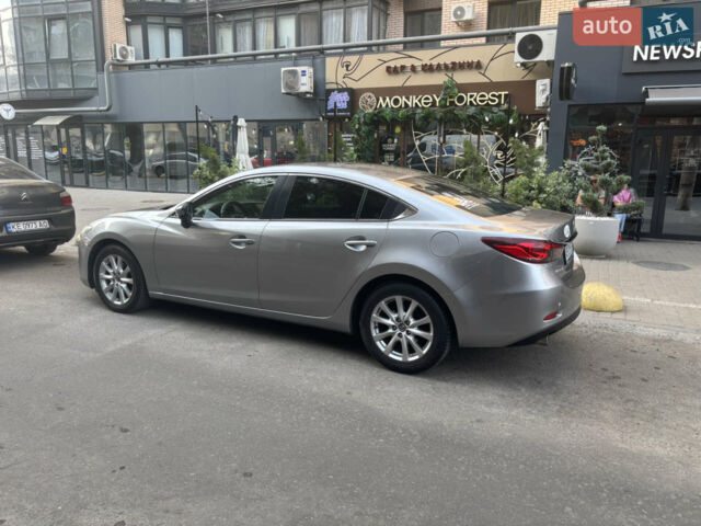 Серый Мазда 6, объемом двигателя 2 л и пробегом 250 тыс. км за 10500 $, фото 1 на Automoto.ua