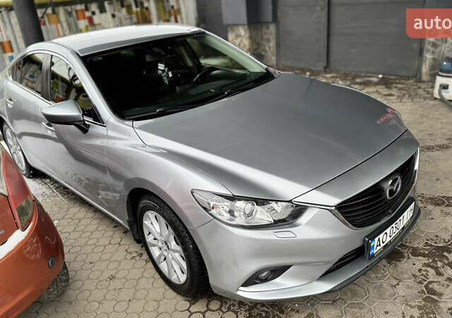 Серый Мазда 6, объемом двигателя 2 л и пробегом 195 тыс. км за 13500 $, фото 1 на Automoto.ua