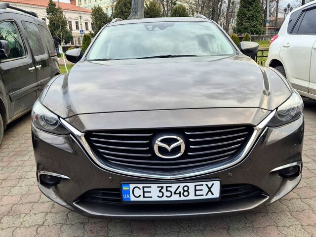 Серый Мазда 6, объемом двигателя 2.2 л и пробегом 300 тыс. км за 13700 $, фото 1 на Automoto.ua