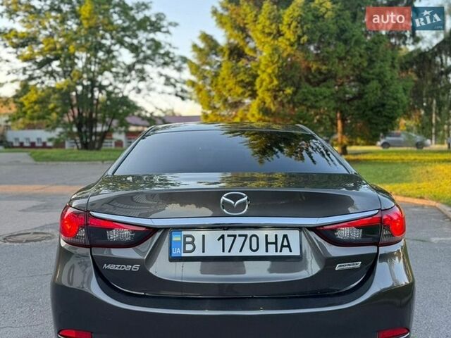 Серый Мазда 6, объемом двигателя 2.49 л и пробегом 156 тыс. км за 10800 $, фото 1 на Automoto.ua
