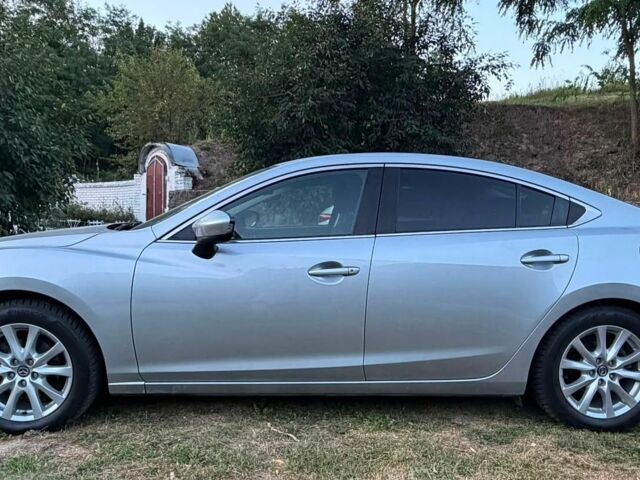 Серый Мазда 6, объемом двигателя 2 л и пробегом 215 тыс. км за 10500 $, фото 1 на Automoto.ua