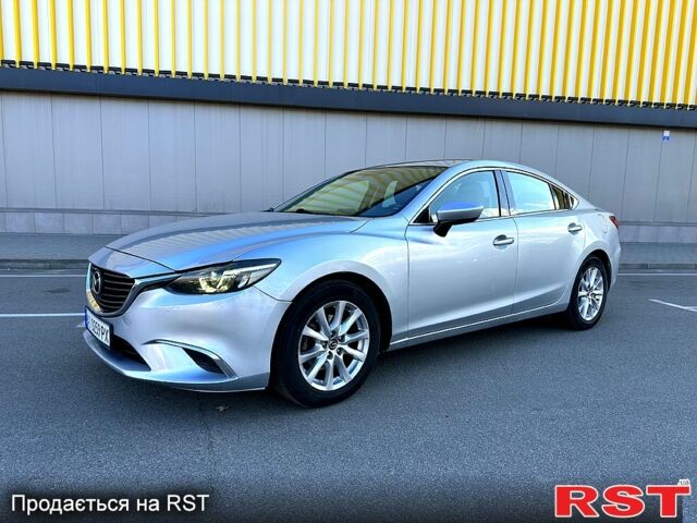 Серый Мазда 6, объемом двигателя 2.5 л и пробегом 196 тыс. км за 9900 $, фото 1 на Automoto.ua