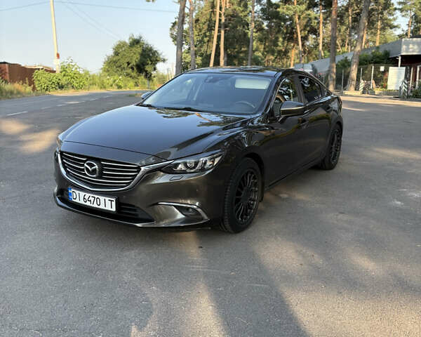 Серый Мазда 6, объемом двигателя 2.19 л и пробегом 167 тыс. км за 14499 $, фото 1 на Automoto.ua