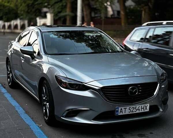 Серый Мазда 6, объемом двигателя 2.49 л и пробегом 155 тыс. км за 15800 $, фото 1 на Automoto.ua