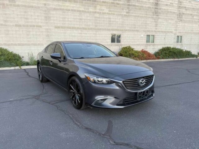 Серый Мазда 6, объемом двигателя 2.5 л и пробегом 80 тыс. км за 10000 $, фото 1 на Automoto.ua