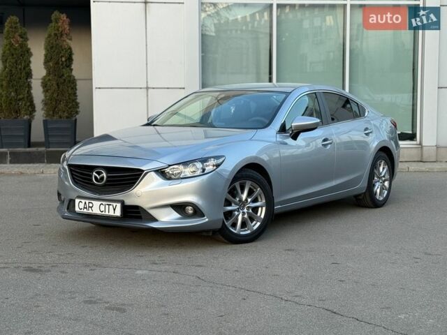 Серый Мазда 6, объемом двигателя 2 л и пробегом 150 тыс. км за 13800 $, фото 1 на Automoto.ua