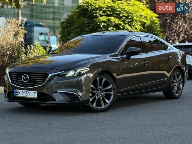 Серый Мазда 6, объемом двигателя 2.49 л и пробегом 201 тыс. км за 14800 $, фото 1 на Automoto.ua