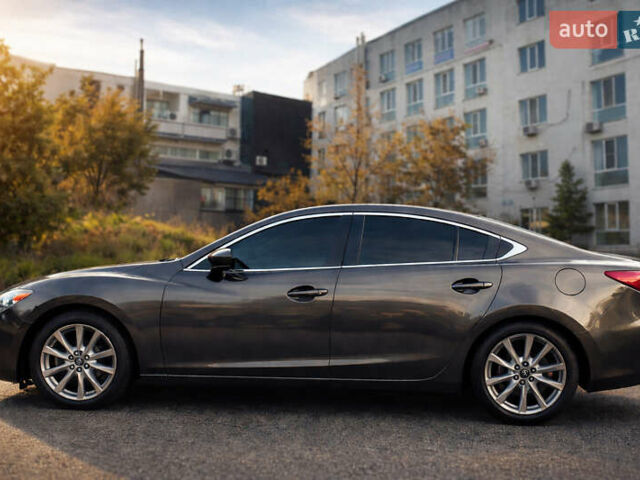 Сірий Мазда 6, об'ємом двигуна 2.49 л та пробігом 162 тис. км за 13999 $, фото 1 на Automoto.ua