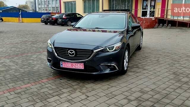 Серый Мазда 6, объемом двигателя 2.19 л и пробегом 184 тыс. км за 14200 $, фото 1 на Automoto.ua
