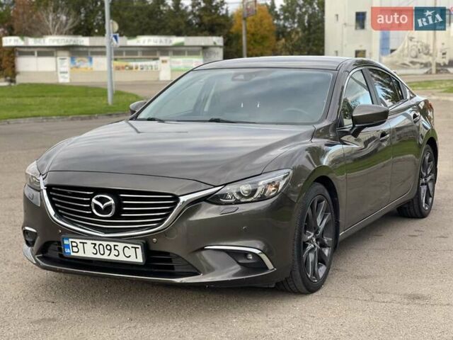 Серый Мазда 6, объемом двигателя 2.49 л и пробегом 97 тыс. км за 15900 $, фото 1 на Automoto.ua