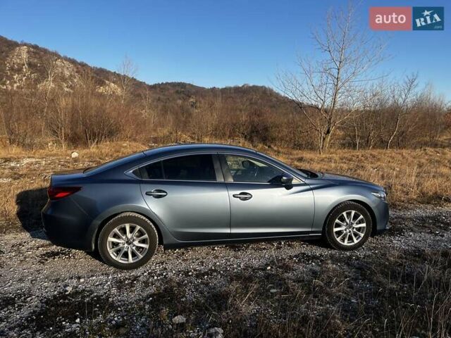 Серый Мазда 6, объемом двигателя 2 л и пробегом 148 тыс. км за 13500 $, фото 1 на Automoto.ua