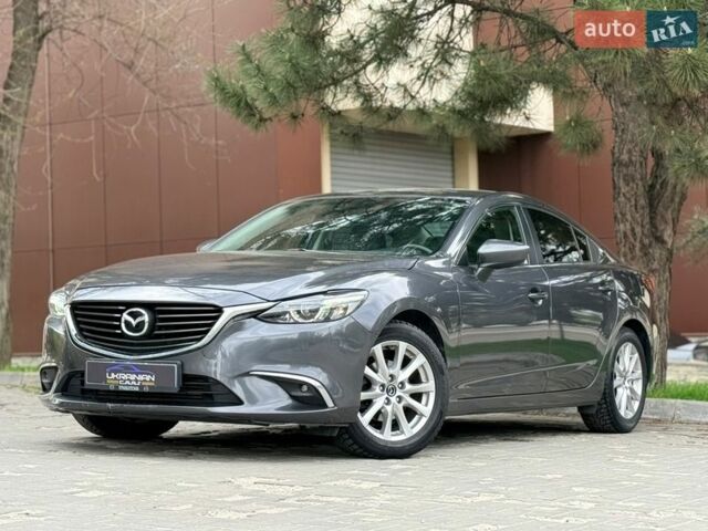 Серый Мазда 6, объемом двигателя 2.19 л и пробегом 144 тыс. км за 12500 $, фото 1 на Automoto.ua