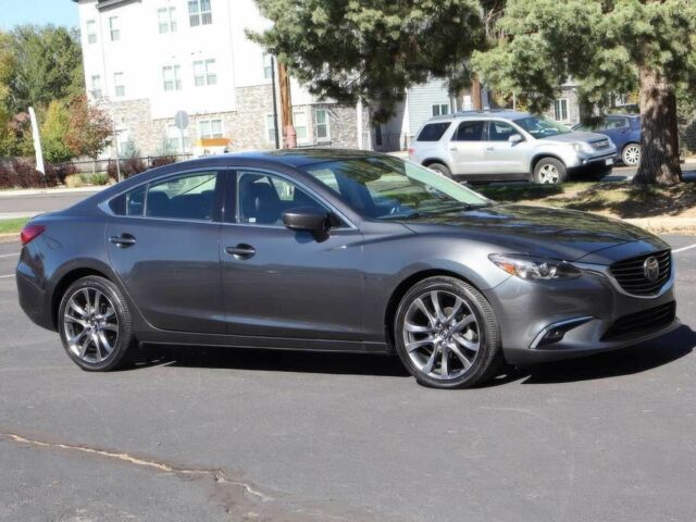 Серый Мазда 6, объемом двигателя 2.5 л и пробегом 57 тыс. км за 6000 $, фото 1 на Automoto.ua